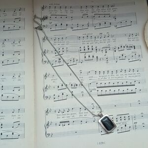 Elegant Silver Necklace with Black Pendant